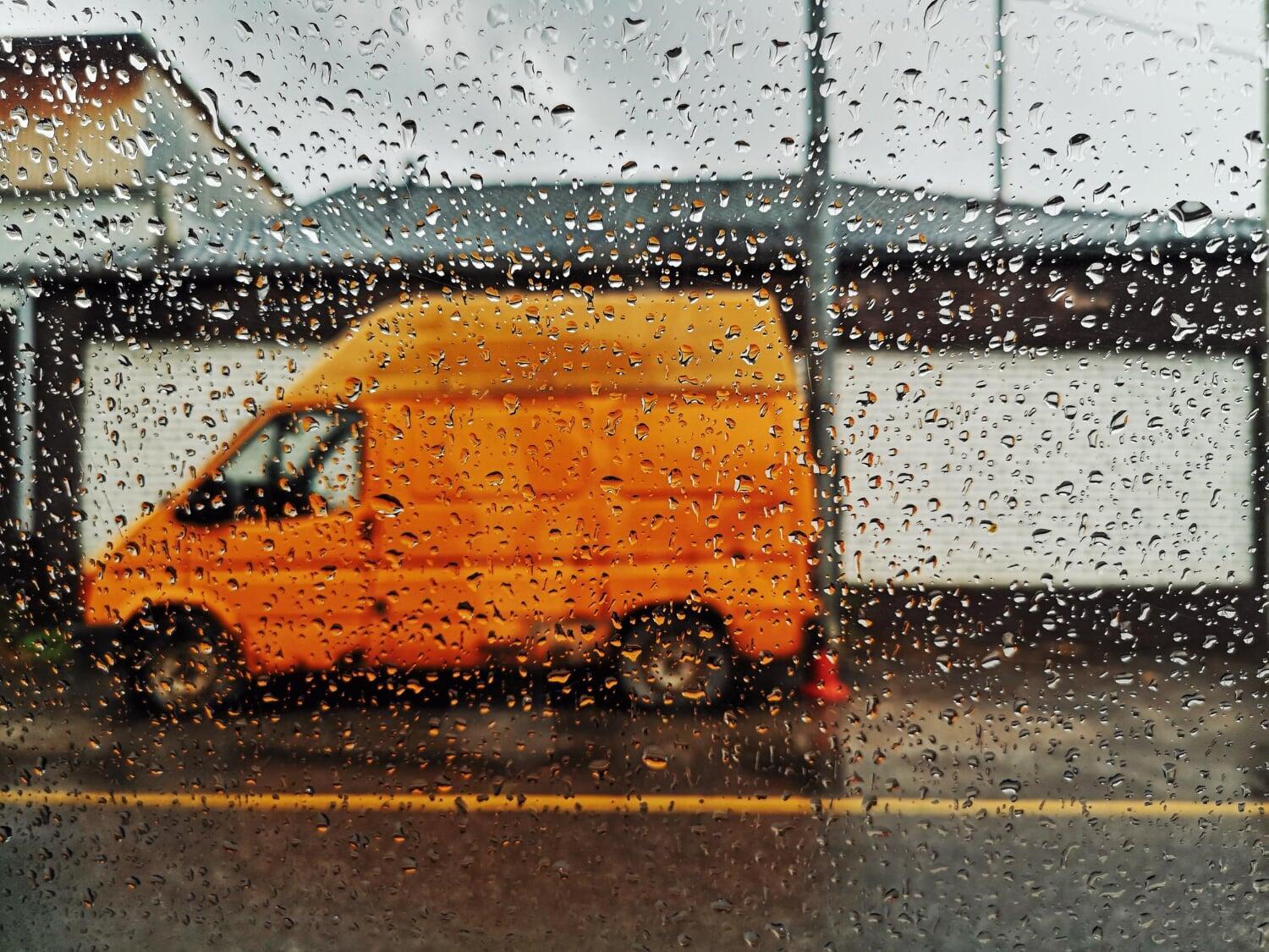 delivery van under the rain